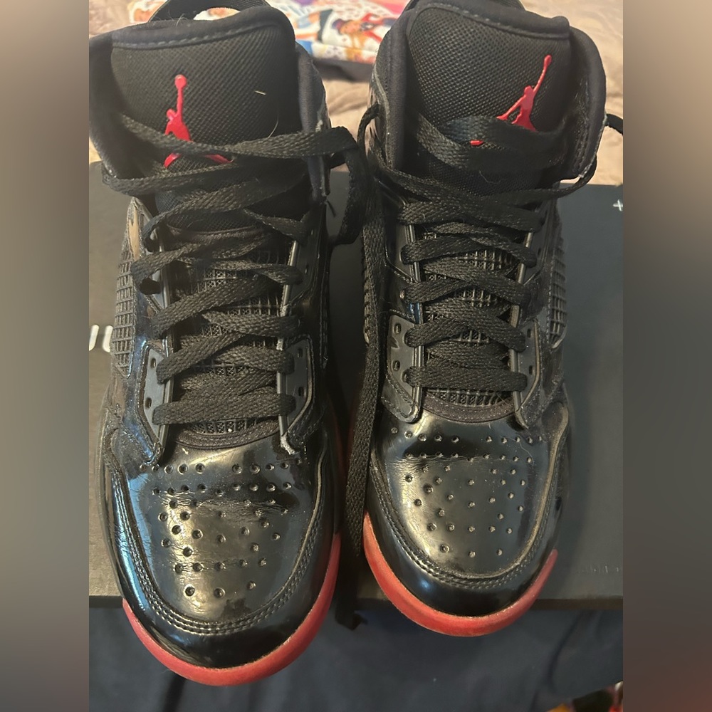 Mike Air Jordan’s Youth Size 6.5. Red and Black Sneakers